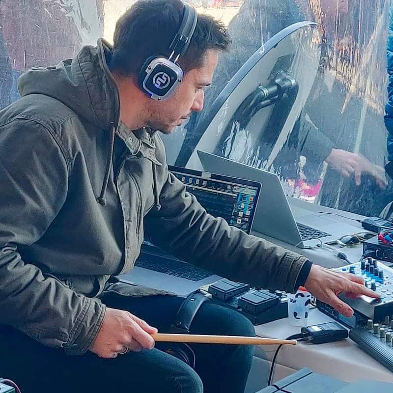 Drummer in Silent Drummer playing with Silentsystem wireless headphones